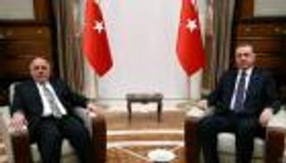 العبادي لأردوغان: سنحرر أرضنا بالرجال لا بالسكايب