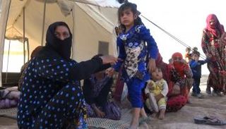 لاجئون عراقيون يصلون سوريا