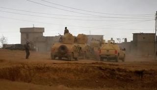 مركبات عراقية جنوبي الموصل