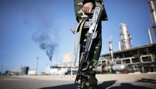 اشتباكات قرب الموانئ النفطية في ليبيا