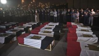 صورة أرشيفية لجنازة شهداء مذبحة رفح