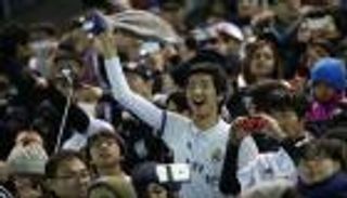 الجماهير اليابانية تنقسم بين الريال وكاشيما