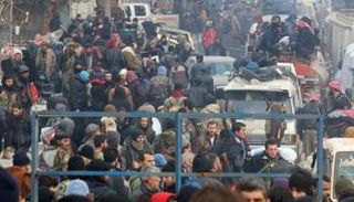 حافلات تغادر حلب