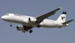 حريق بطائرة إيرانية أثناء هبوطها في مطار مهرآباد