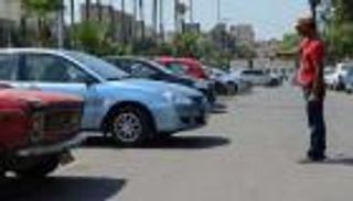 "السايس".. سيف على رقاب قائدي السيارات بمصر