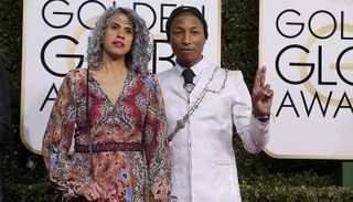 الموسيقى فاريل ويليامز وزوجته هيلين