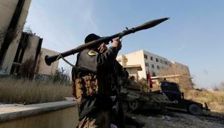 القوات العراقية أمام جامعة الموصل