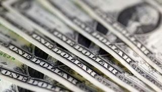 الدولار تراجع أقل من 0.1%