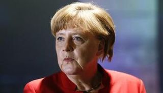 ميركل: قيود ترامب على الهجرة غير مبررة