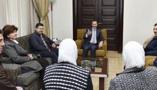 الأسد خلال استقبال رجال الصناعة فى دمشق 