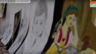 بكماء تبدع في رسم قصص الحرب السورية