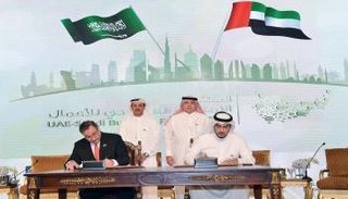 توقيع الاتفاقية بين حوكمة ونظيره السعودي