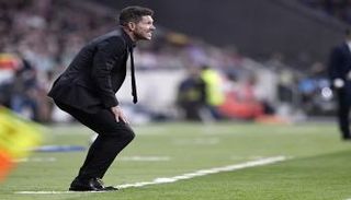 سيميوني يصف التعادل ضد برشلونة بالعادل