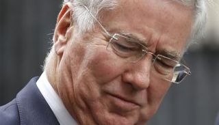 فالون خلال مغادرته الوزارة - أ. ف. ب