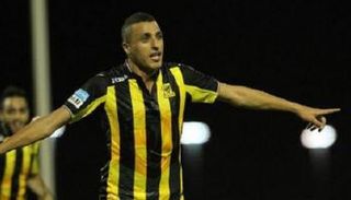 تكريم العكايشي لتأهل تونس