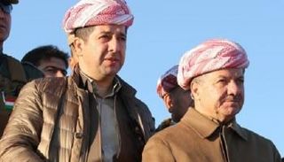 مسعود بارزاني وإلى الشمال نجله مسرور 