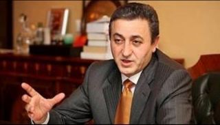 أورهان أوكمان رئيس منظمة التصنيف الائتماني اليابانية