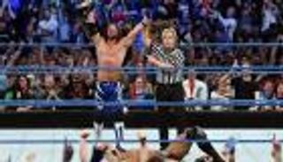 ستايلز يقتنص بطولة WWE من ماهال ويضرب موعدا مع ليسنر