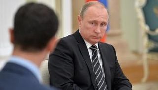 فلاديمير بوتين وبشار الأسد 