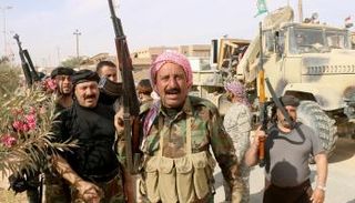 قوات الحشد الشعبي في إحدى المدن الحدودية