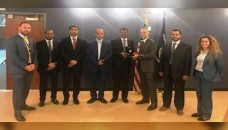 وفد شرطة أبوظبي خلال الزيارة