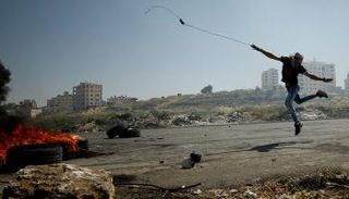 فلسطيني في اشتباكات سابقة بالقدس المحتلة - أرشيفية