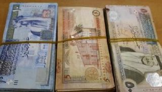 عملات أردنية من فئات مختلفة - أرشيف