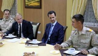  الرئيس بوتين خلال زيارته المفاجئة إلى سوريا - أ. ف. ب