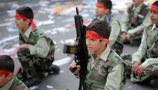 أطفال تجندهم إيران للقتال في سوريا