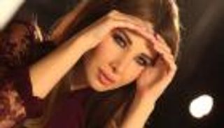 نانسي عجرم تتصدر غلاف "فوج" للأزياء في 2018