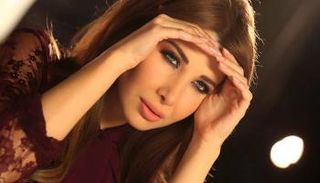 نانسي عجرم نجمة غلاف مجلة فوج 