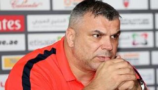 أولاريو كوزمين مدرب الأهلي