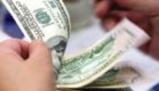 إجازات فى الصين تهبط بالدولار أمام الجنيه المصري