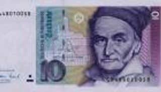 ميركل تلمح لإعادة المارك الألماني بسبب إخفاقات اليورو