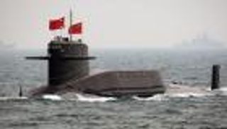 بكين تشيِد مبان في بحر الصين الجنوبي تمكنها من استيعاب صواريخ