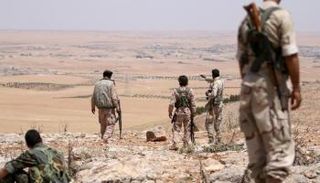 مقاتلون من مجلس منبج في جنوب حلب (رويترز)