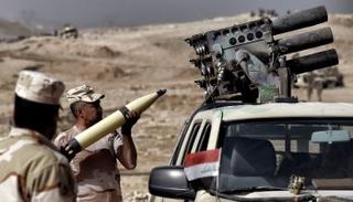 ضباط بالجيش العراقي خلال معركة غرب الموصل (الفرنسية)