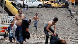 عراقيون يفرون من مناطق يسيطر عليها داعش