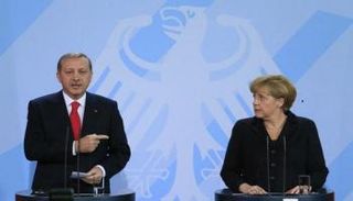 ميركل وأردوغان في لقاء سابق - أرشيفية