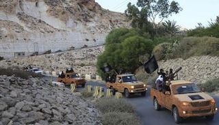 مسلحون منتمون لتنظيم داعش الإرهابي