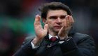 مشجع لميدلزبره يدعم مدربه "المقال" أمام يونايتد