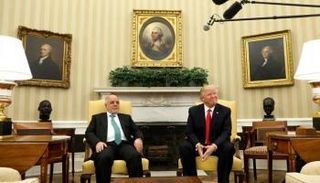 ترامب والعبادي في البيت الأبيض - رويترز