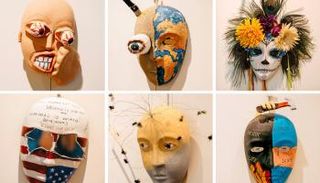 عدد من الأقنعة التي صممها ضحايا الحروب