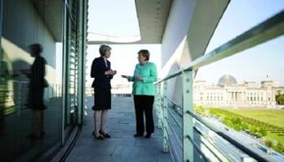 ميركل وتريزا ماي