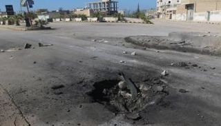 حفرة في موقع الهجوم الكيماوي بإدلب