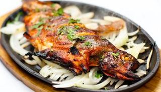 أكل الأسماك يشعر ك بالسعادة