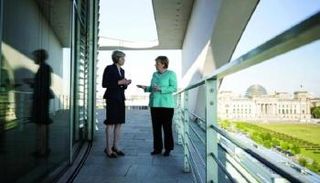 ميركل وتيريزا ماي