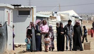 لاجئون سوريون في مخيم الزعتري بالأردن