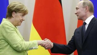 أنجيلا ميركل خلال لقاء فلاديمير بوتين