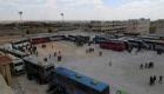  بدء إجلاء معارضين سوريين من إحدى ضواحي دمشق